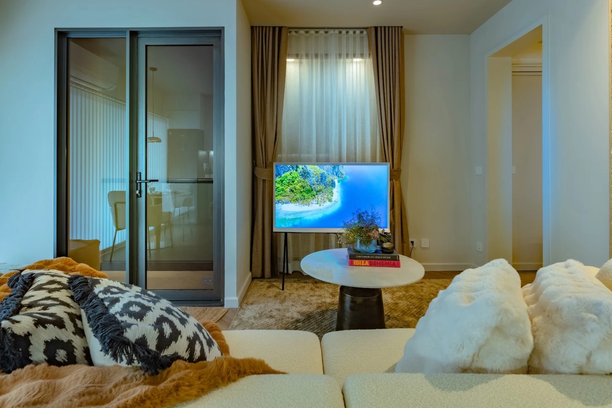 The Zero Bangtao — living room with balcony doors